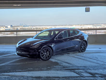 Load image into Gallery viewer, Tesla in winter conditions with Michelin XIce